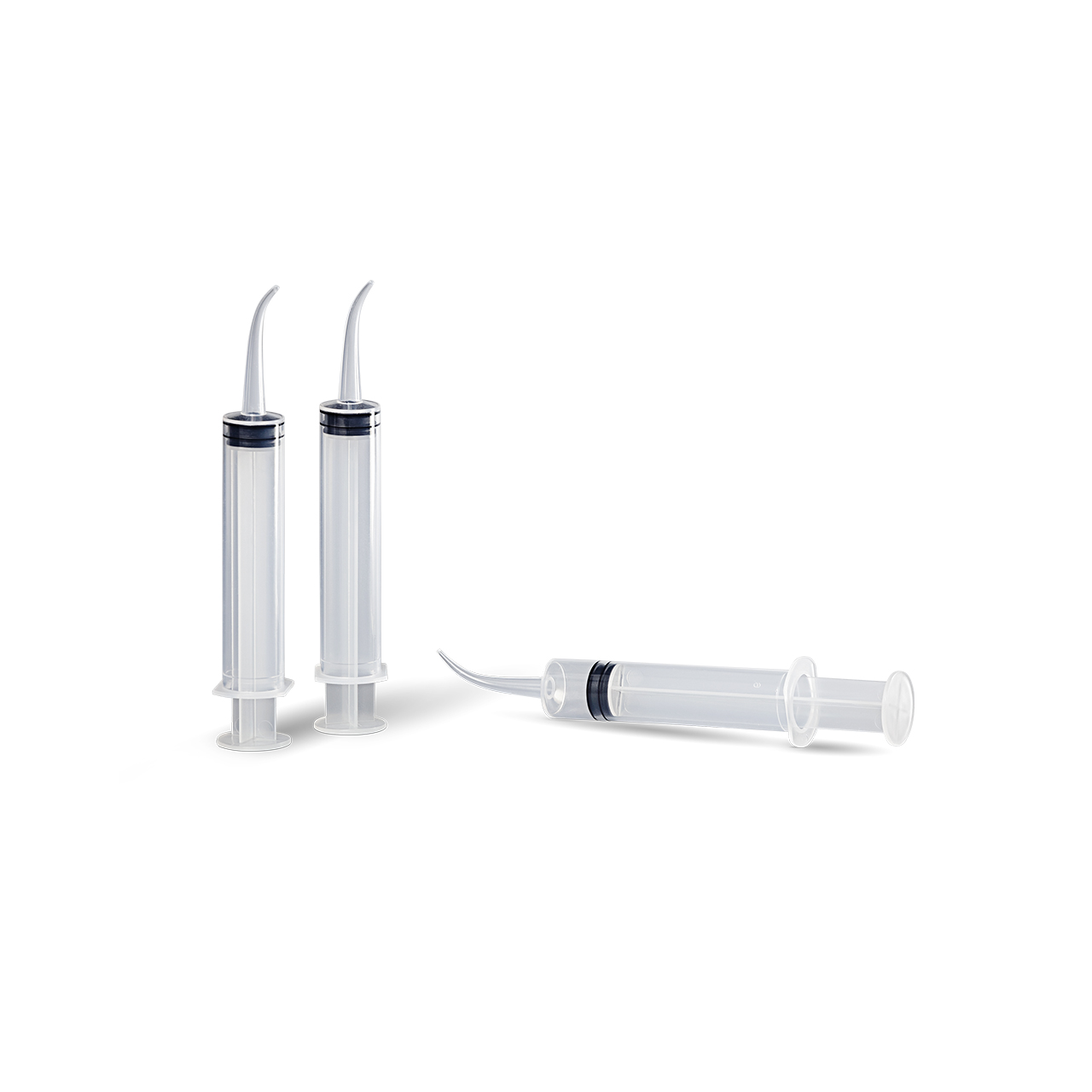 an impression material syringe with a curved tip is next to two other syringes