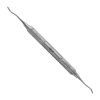 a dental instrument with a stainless steel handle.