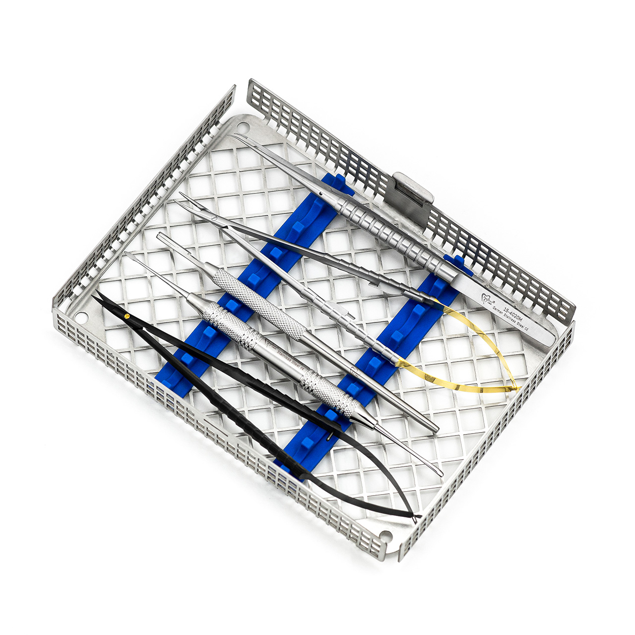 a set of dental instruments in a stainless steel tray
