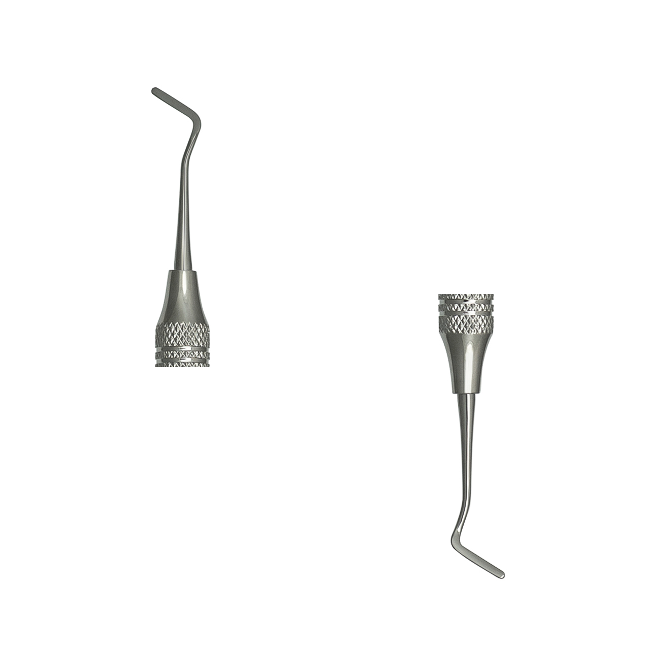 a pair of stainless steel dental instruments.